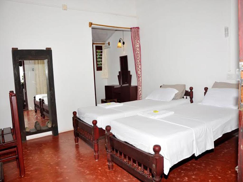 Angeo Beach House Alappuzha Kamer foto