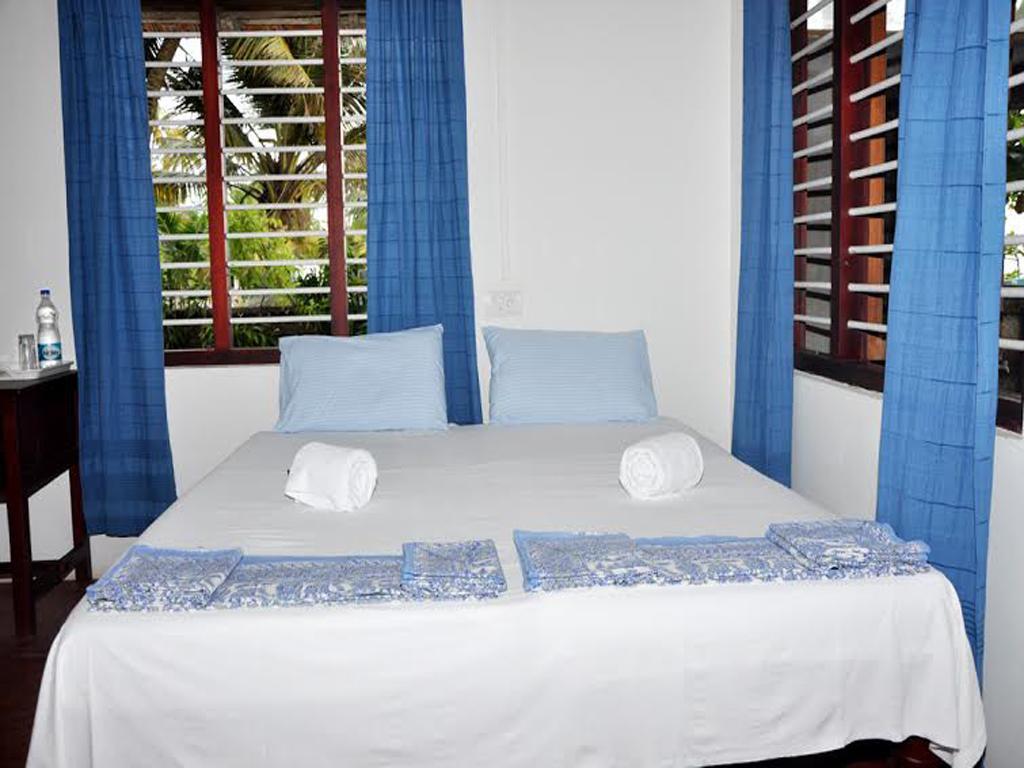 Angeo Beach House Alappuzha Kamer foto